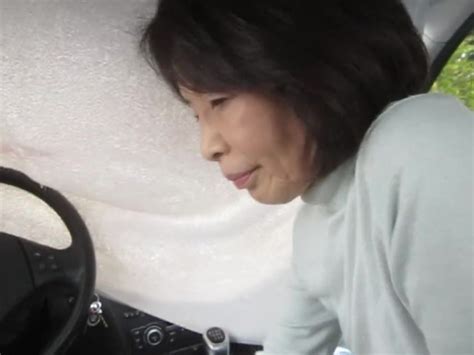 I look at my husband in the driver seat and we smile at eachother. . Asian car bj